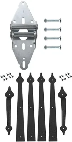 A galvanized garage door hinge with its bolts, above a set of black decorative strap hinges.